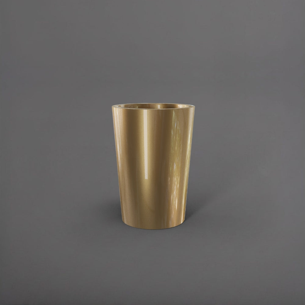 Tagel Tapered Round Fiberglass Planter in gloss metallic gold against gray background.