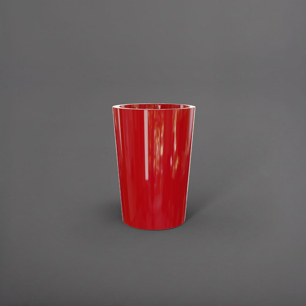 Tagel Tapered Round Fiberglass Planter in gloss red against gray background.