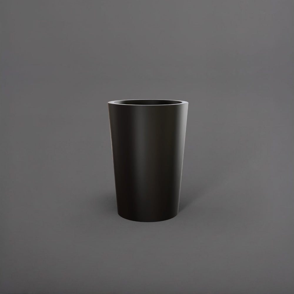Tagel Tapered Round Fiberglass Planter in matte black against gray background.