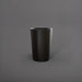 Tagel Tapered Round Fiberglass Planter in matte black against gray background.