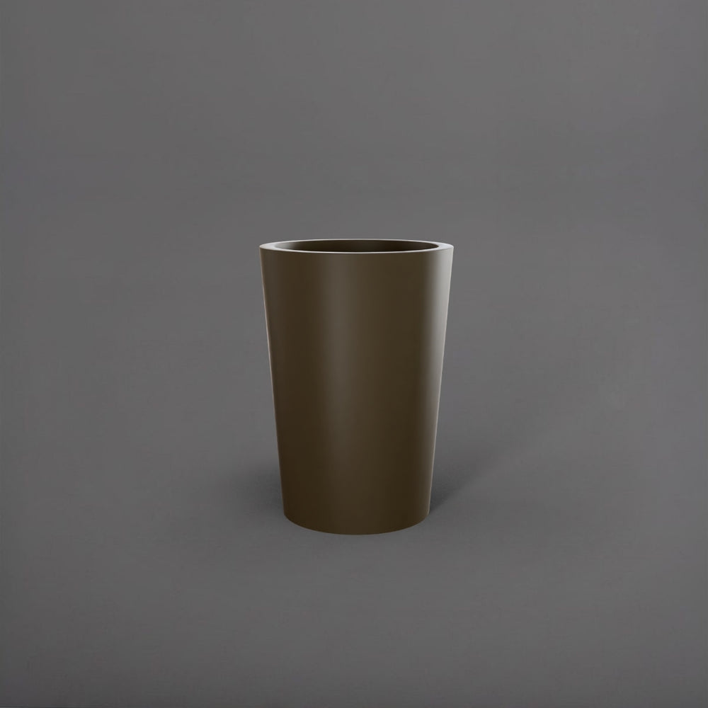 Tagel Tapered Round Fiberglass Planter in matte bronze against gray background.
