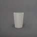 Tagel Tapered Round Fiberglass Planter in matte cement grey against gray background.
