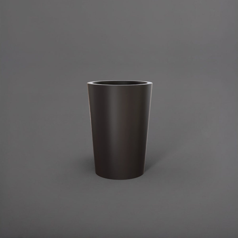 Tagel Tapered Round Fiberglass Planter in matte charcoal against gray background.