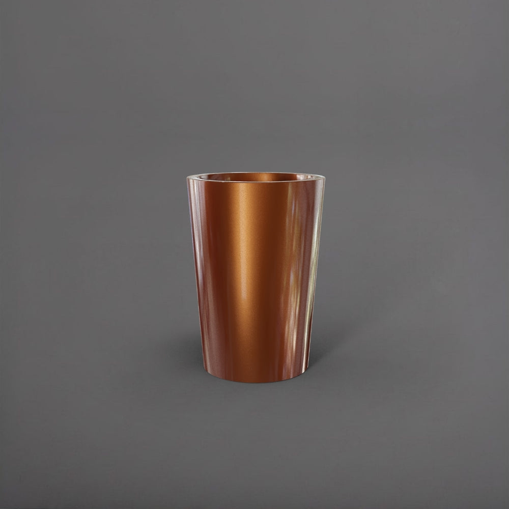 Tagel Tapered Round Fiberglass Planter in metallic bronze against gray background.