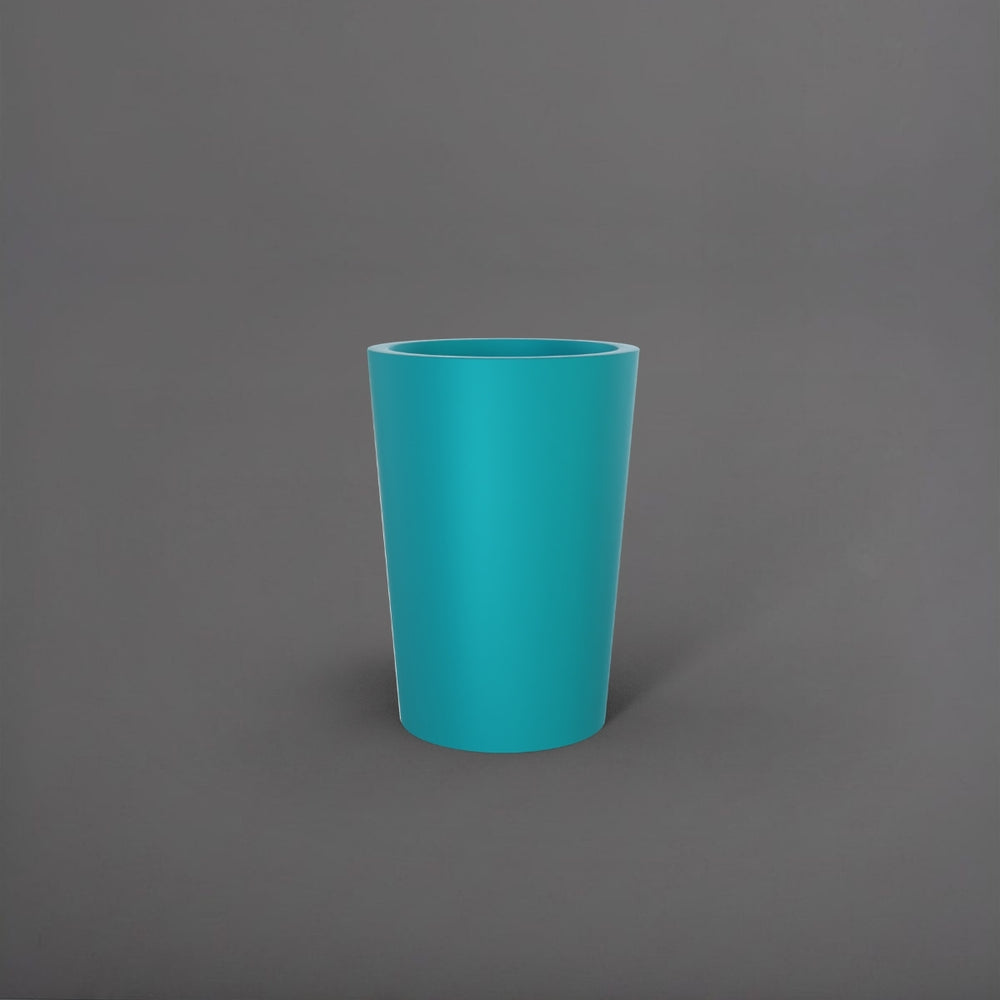 Tagel Tapered Round Fiberglass Planter in satin seafoam green against gray background.