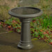 Terrace Birdbath in antique glazed on concrete in the backyard.
