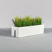 Tiergarden Railing Fiberglass Planter on concrete filled with plants.