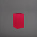 Tolga Corner Fiberglass Planter in gloss red against gray background.