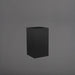 Tolga Corner Fiberglass Planter in matte black against gray background.
