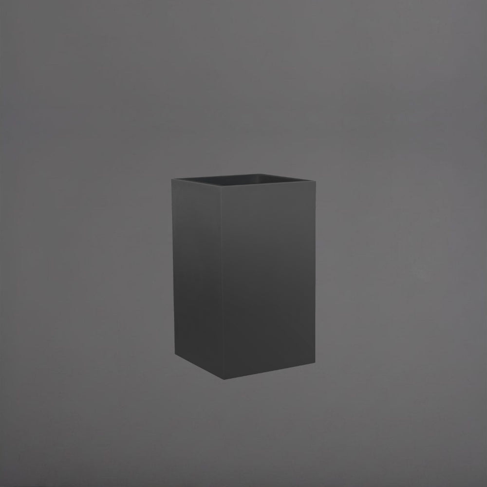 Tolga Corner Fiberglass Planter in matte charcoal against gray background