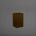 Tolga Corner Fiberglass Planter in matte dark brown against gray background.
