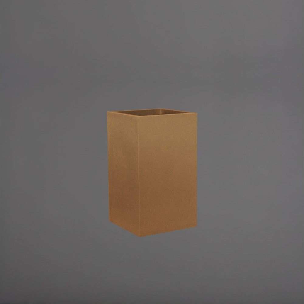 Tolga Corner Fiberglass Planter in metallic bronze against gray background.