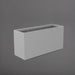 Tolga Rectangle Fiberglass Planter in matte cement grey against gray background.
