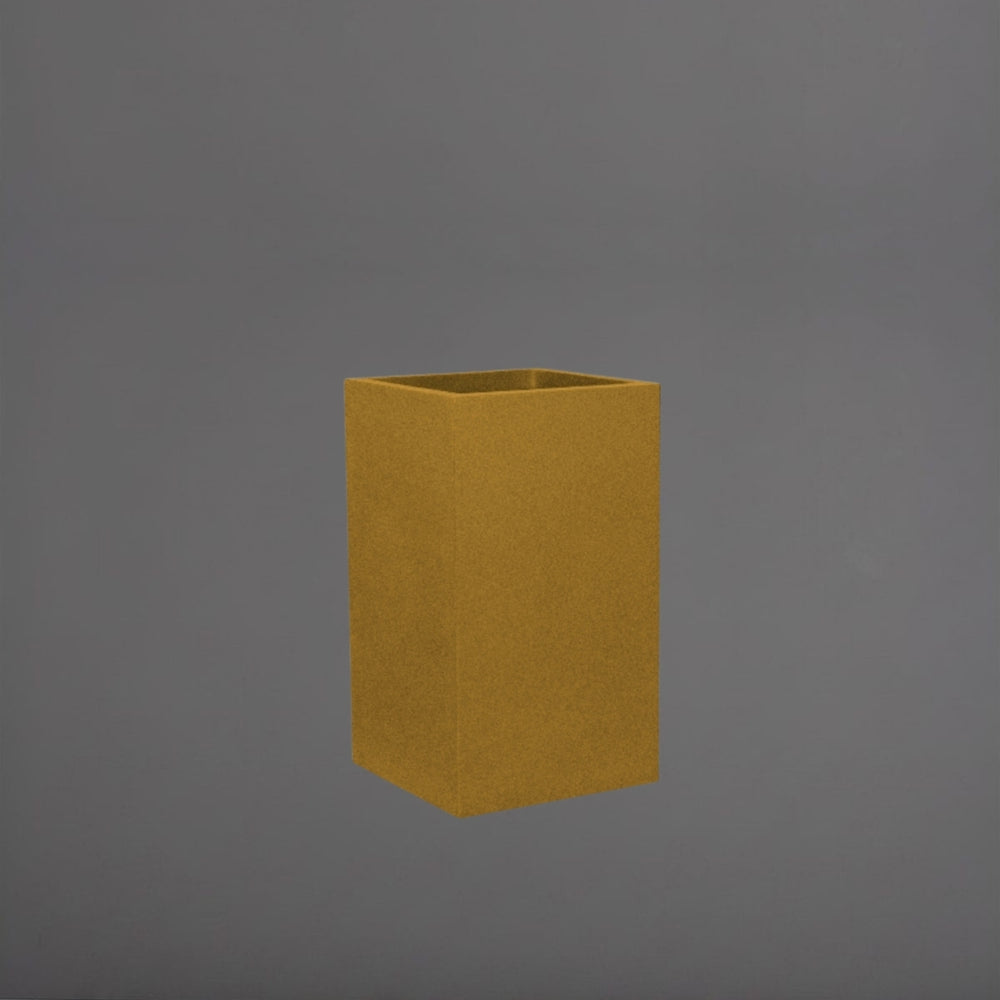Torino Corner Fiberglass Planter in gloss metallic gold against gray background.