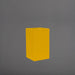 Torino Corner Fiberglass Planter in gloss saffron against gray background.