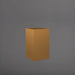 Torino Corner Fiberglass Planter in metallic bronze against gray background.