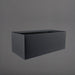 Torino Wide Rectangle Fiberglass Planter in matte charcoal against gray background.