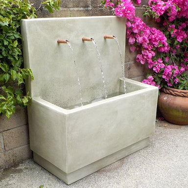 Tribus Wall Fountain in the backyard.