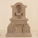 Uva Wall Fountain against brown background.