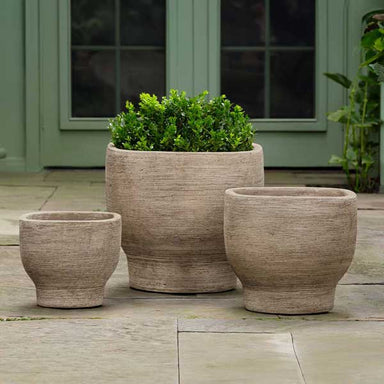 Vail Planter - Brown Terra Cotta - S/3 on concrete filled with plants