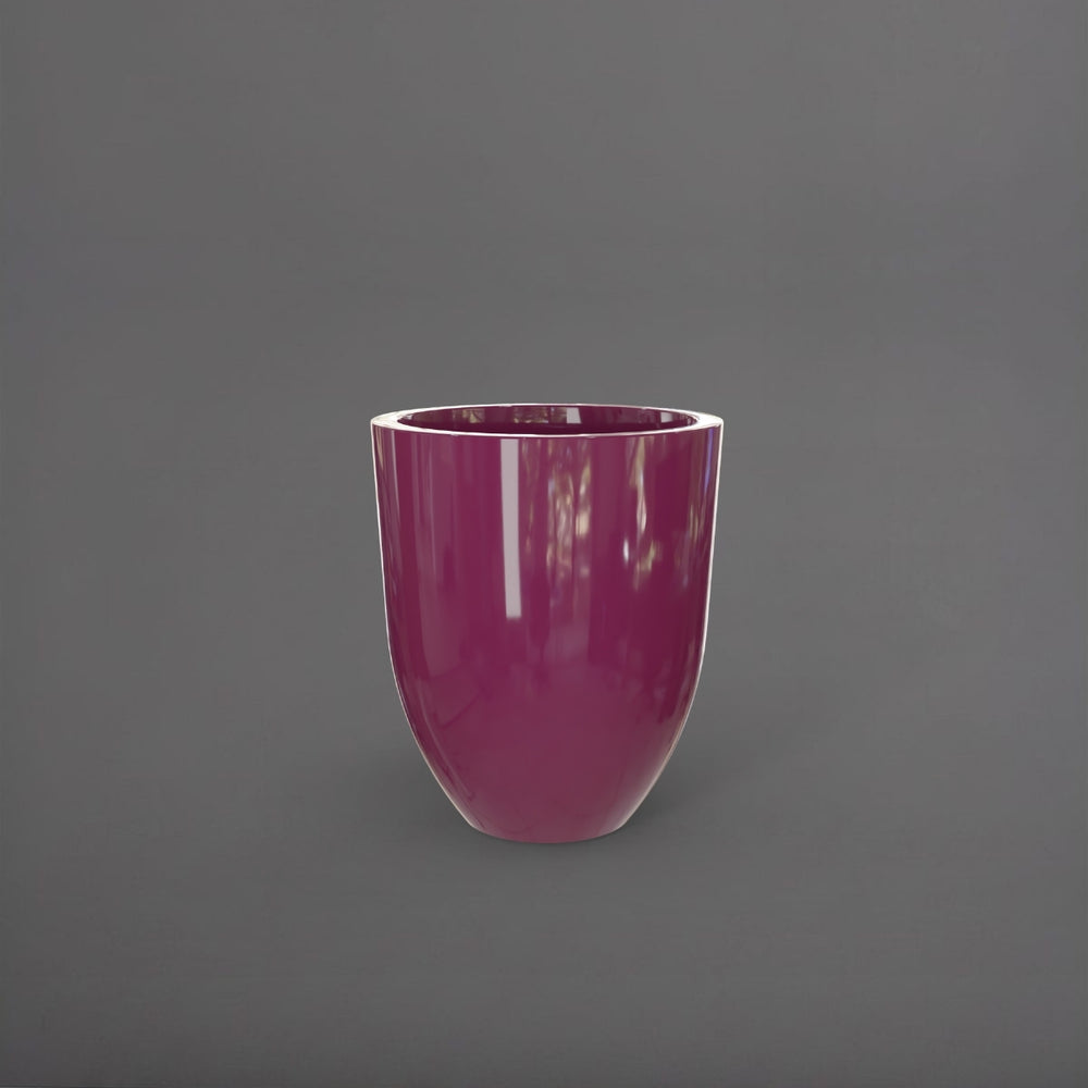 Valencia Tapered Round Fiberglass Planter in gloss eggplant against gray background.