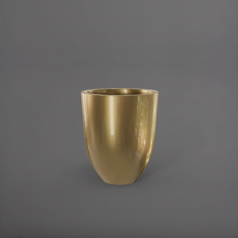 Valencia Tapered Round Fiberglass Planter in gloss metallic gold against gray background.