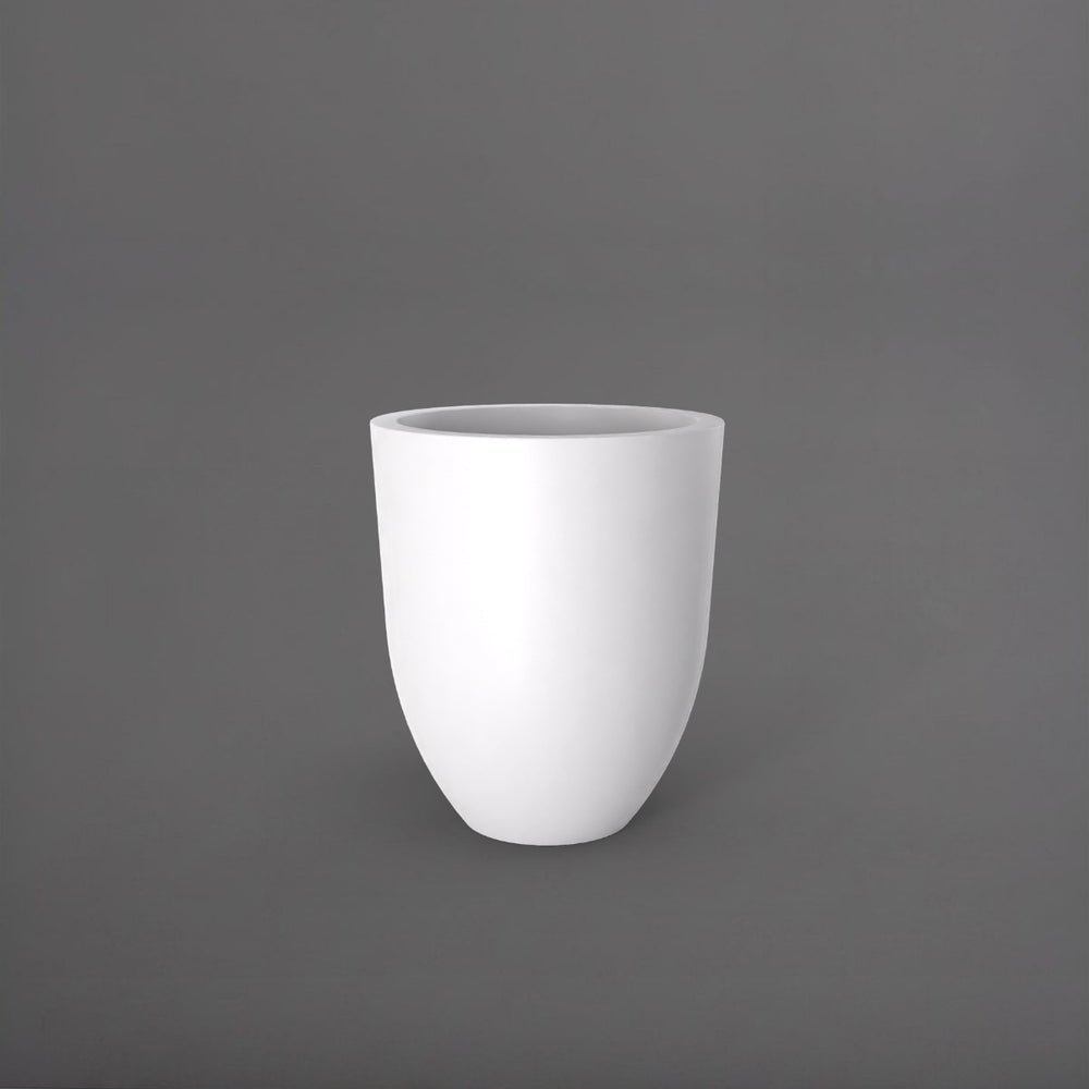Valencia Tapered Round Fiberglass Planter in matte bright white against gray background.