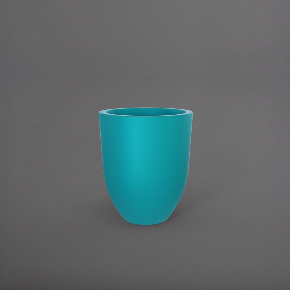 Valencia Tapered Round Fiberglass Planter in satin seafoam green against gray background.