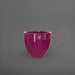 Wannsee Extra Large Round Fiberglass Planter in gloss eggplant against gray background.