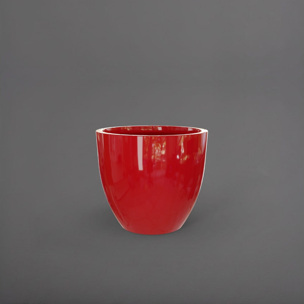 Wannsee Extra Large Round Fiberglass Planter in gloss red against gray background.