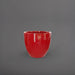 Wannsee Extra Large Round Fiberglass Planter in gloss red against gray background.