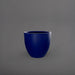 Wannsee Extra Large Round Fiberglass Planter in matte cobalt blue against gray background.