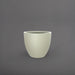 Wannsee Extra Large Round Fiberglass Planter in satin beige against gray background.