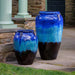 Water Jar Planter, Tall and Short - Running Blue/Brown - S/1 on concrete in the backyard