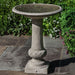 Williamsburg Knot Garden Birdbath on concrete in the backyard