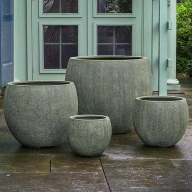 York Planter, Large - Verdigris Lite on concrete in the backyard