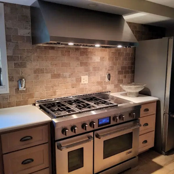 Zen Oval Tabletop Fountain in Alpine Stone in action on kitchen countertop