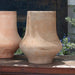 Zuma Planter - Antico Terra Cotta - S/4 on ledge in the backyard