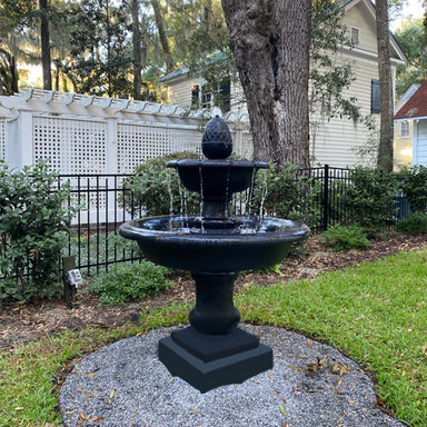 Campania Wiltshire fountain in black gravel in yard running