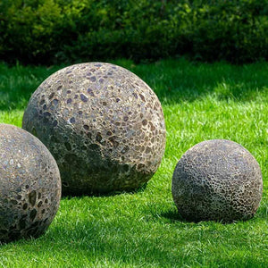 Angkor Spheres - Fossil Grey - Set of 3 on grass in the backyard
