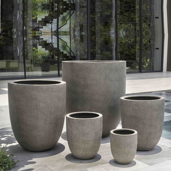 Bradford Planter, Large - Riverstone Premium Lite - S/1 against glass-wall