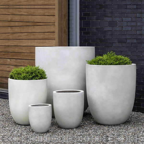 Bradford Planter, Medium - Ivory Lite - S/1 on gravel filled with plants