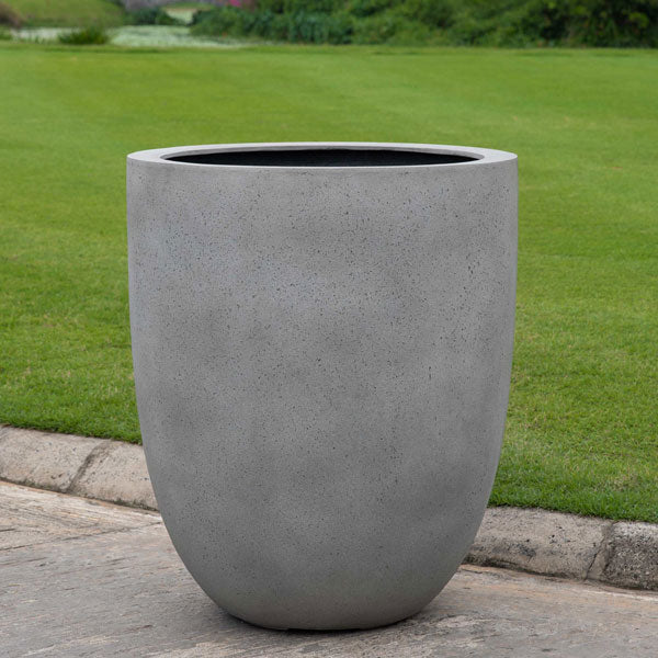 Bradford Planter, Small - Stone Grey Lite - S/1 on concrete in the backyard