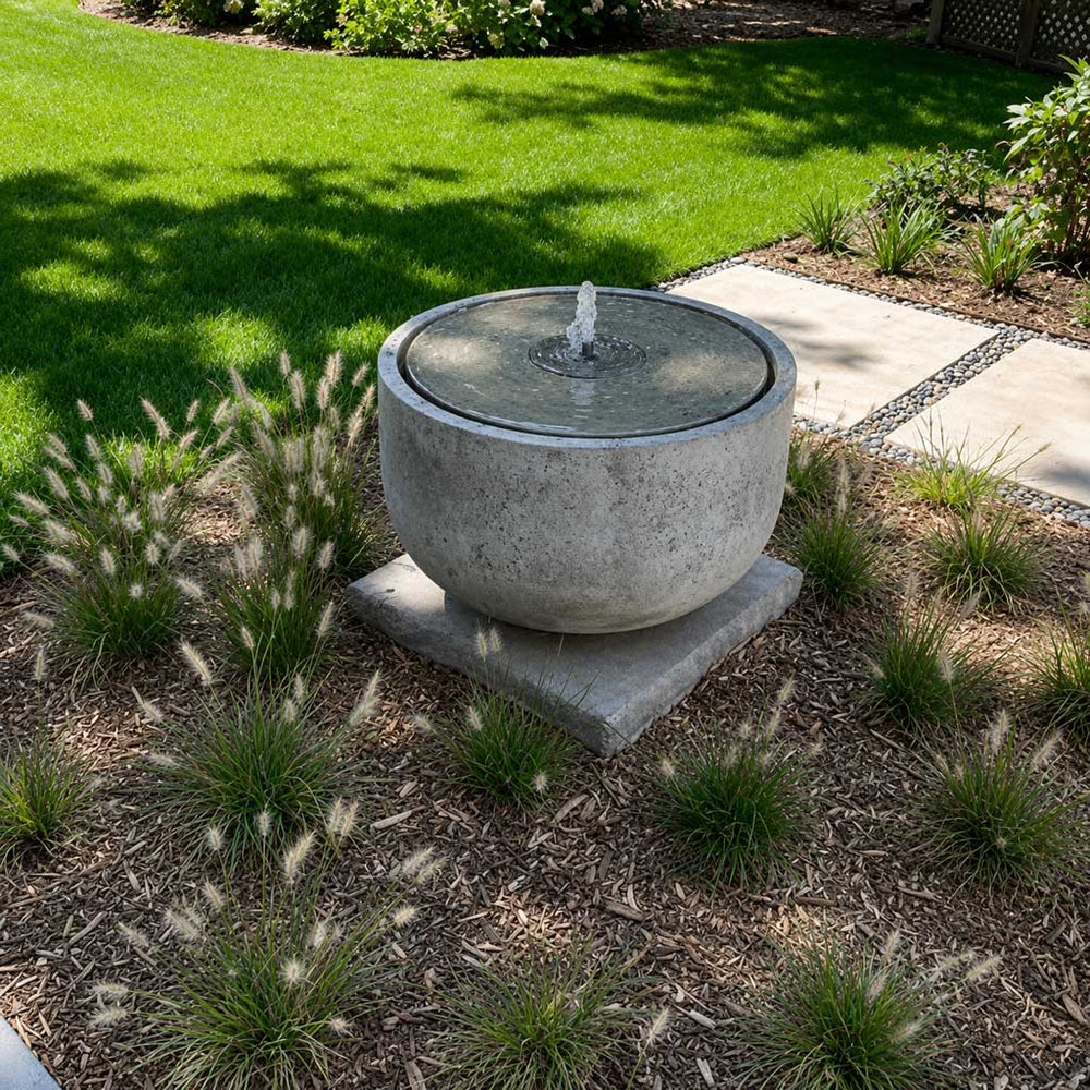 Campania International Echo Park Fountain surrounded by plants in backyard