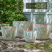 Cassia Planter - Vicolo Terra Set of 4 on concrete in the backyard