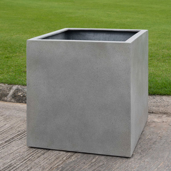 Farnley Planter 2828 - Stone Grey Lite S/1 on concrete in the backyard