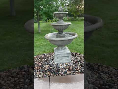 Campania Fonthill Fountain set on small rocks in backyard in action