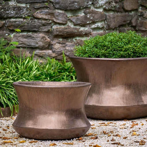 Jura Planter Bronze S/2 on gravel filled with plants