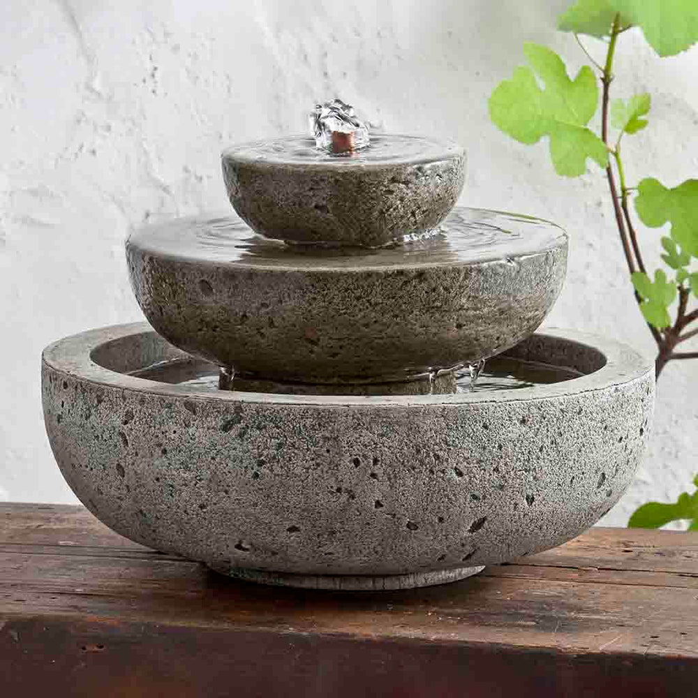 M-Series Platia Fountain on table against white wall