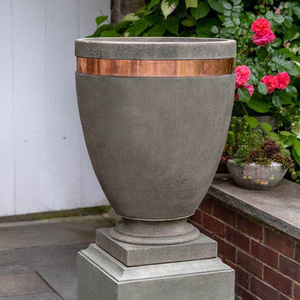 Moderne Tall Planter beside plants in the backyard